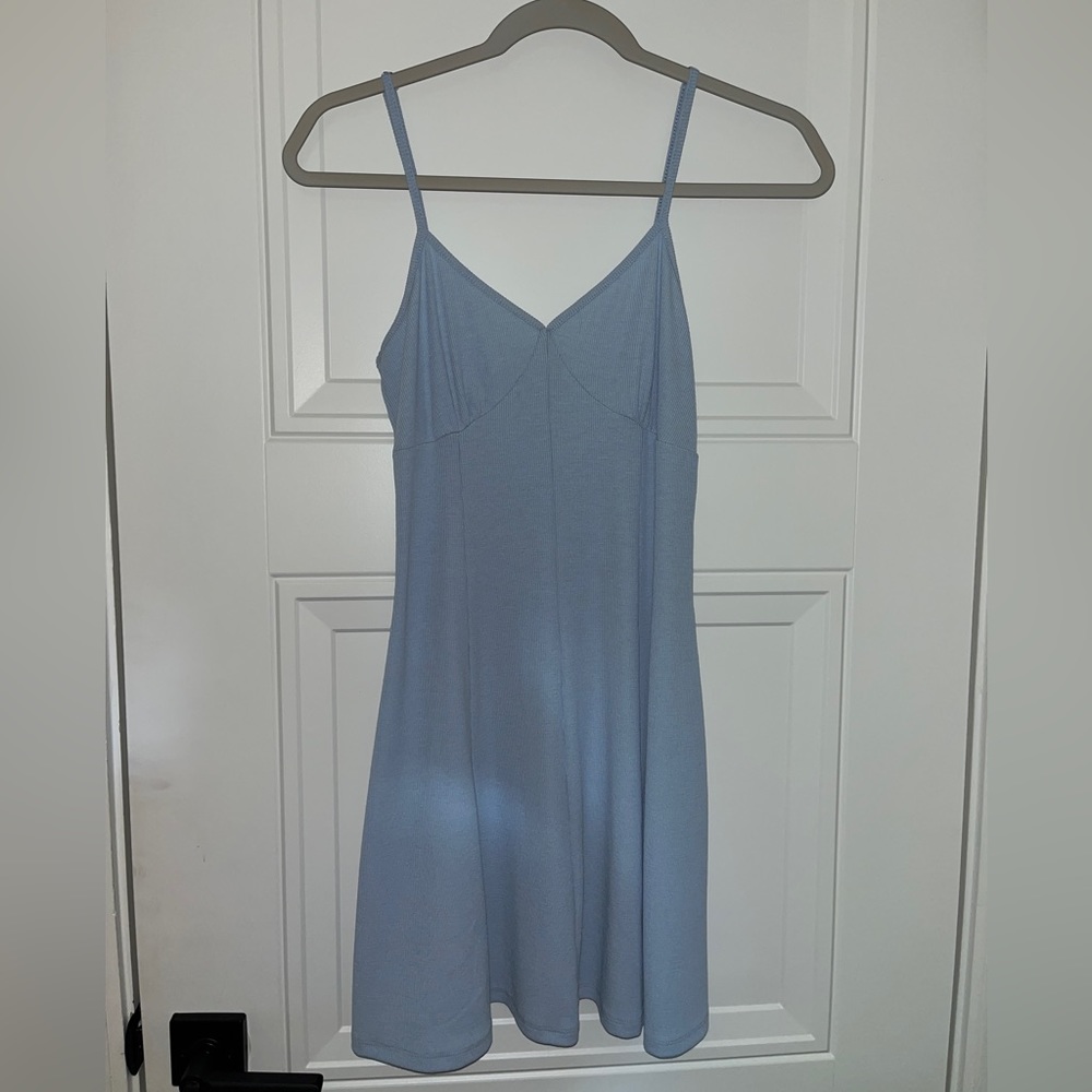 Blue bodycon but flowy mini dress.